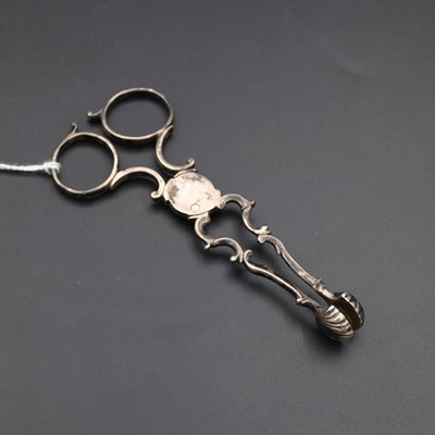 Lot 263 - A pair of white metal grape scissors, having...