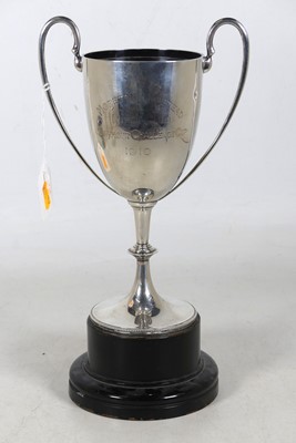 Lot 275 - An Edwardian silver twin handled presentation...