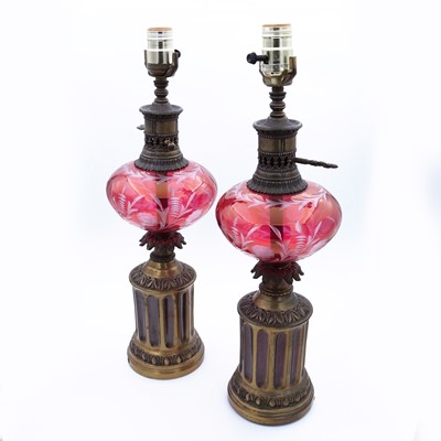 Lot 1 - A pair of contemporary metal-mounted cranberry...