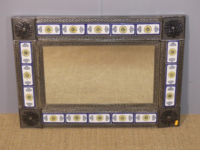 Lot 617 - A contemporary pressed metal and glazed tile...