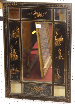 Lot 620 - A chinoiserie black lacquered and gilt...