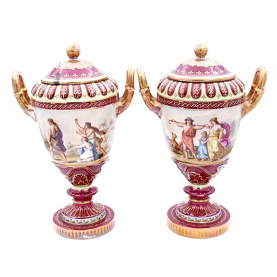 Lot 22 - A pair of Vienna porcelain urns and covers,...