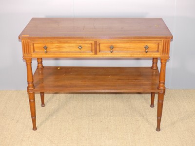 Lot 623 - A circa 1900 walnut two-drawer two-tier side...