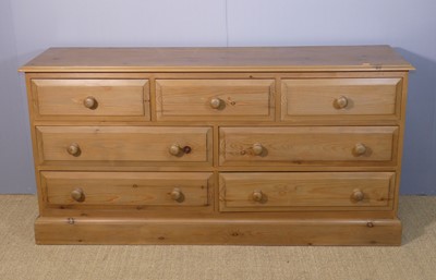 Lot 629 - A contemporary pine side chest, fitted with an...