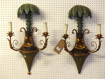 Lot 634 - A pair of painted, gilded and wired metal...