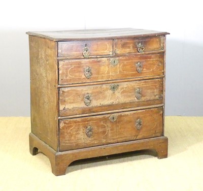 Lot 641 - An 18th century provincial oak and inlaid...