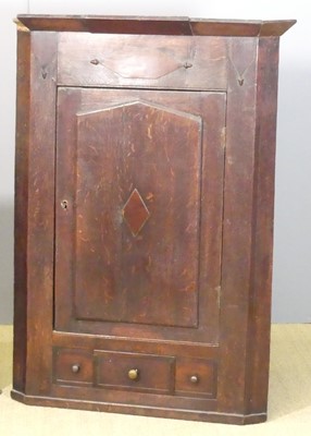 Lot 644 - A circa 1800 provincial oak single door...