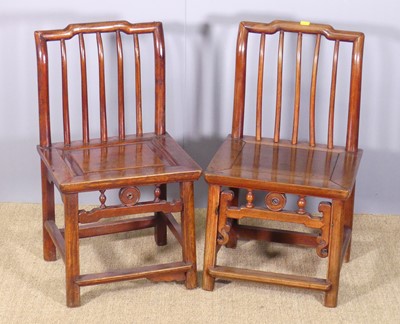Lot 648 - A near-pair of Chinese child's elm panelled...