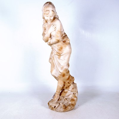 Lot 40 - A 20th century carved alabaster figure of a...