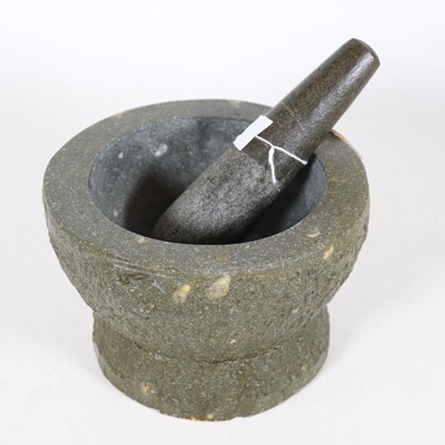 Lot 49 - A contemporary carved granite pestle and...