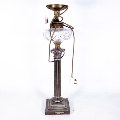 Lot 52 - An early 20th century converted oil lamp,...