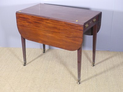 Lot 649 - An early 19th century mahogany Pembroke table,...