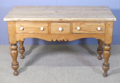 Lot 653 - A rustic planked top pine compact kitchen side...