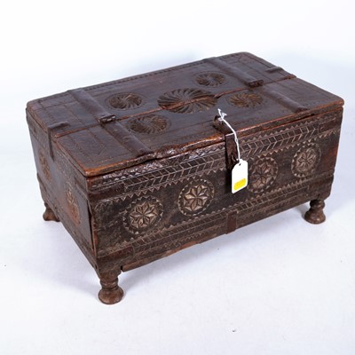 Lot 58 - A 19th century Indian iron bound carved...