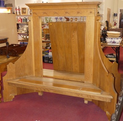 Lot 655 - A blond oak school changing room bench seat,...