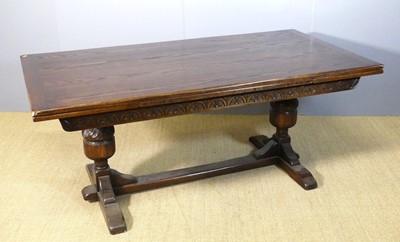 Lot 658 - A joined oak drawleaf refectory table, having...