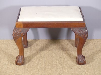 Lot 659 - A mahogany acanthus leaf carved dressing stool,...