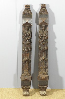 Lot 660 - A pair of relief carved oak wall columns, each...