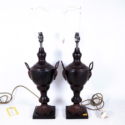 Lot 62 - A pair of contemporary patinated metal urn...