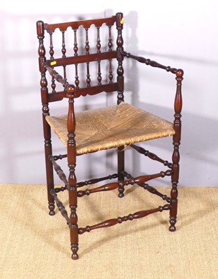 Lot 667 - An Aesthetic Movement mahogany spindle turned...