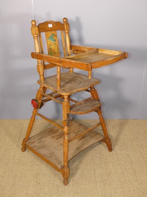 Lot 674 - A stained beech child's high chair, with...