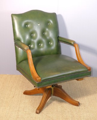 Lot 675 - A contemporary green vinyl buttonback...