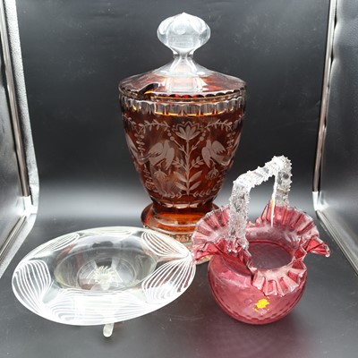 Lot 68 - A contemporary amber glass jar and cover,...