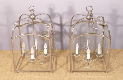Lot 685 - A pair of contemporary chromed metal hanging...