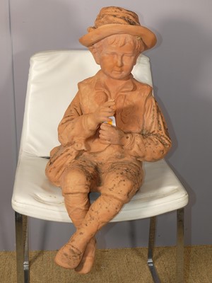 Lot 687 - A contemporary terracotta garden figure of a...