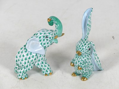 Lot 101 - A Herend hand-painted porcelain figure of an...