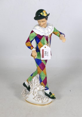 Lot 114 - A Royal Doulton porcelain figure 'Harlequin',...
