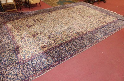 Lot 715 - A large Persian woollen red, blue and cream...