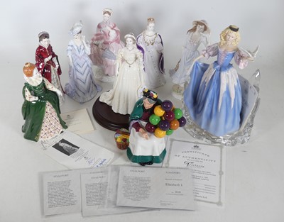 Lot 123 - A collection of porcelain figures, to include...