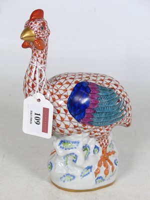 Lot 109 - A Herend hand-painted porcelain figure of a...