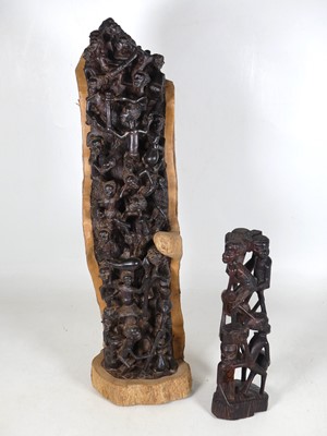 Lot 199 - An African carved hardwood figure group of...