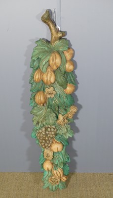 Lot 136 - A French painted plaster panel, in the form of...