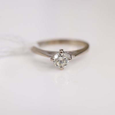 Lot 279 - A modern 18ct white gold diamond solitaire...