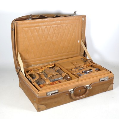 Lot 234 - An Art Deco vanity case, the simulated leather...