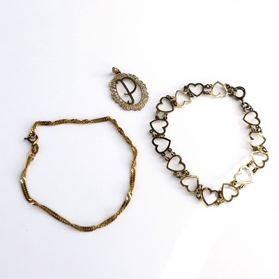 Lot 307 - Modern 9ct gold comprising flat link bracelet,...