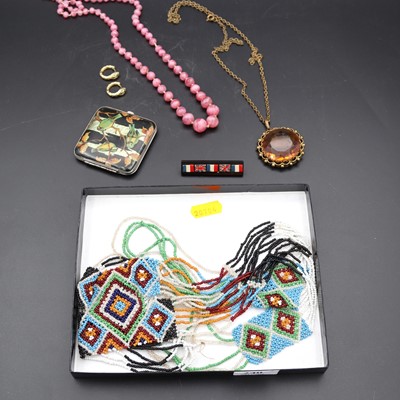 Lot 240 - A South American beaded necklace, together...