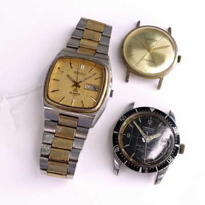 Lot 322 - A gent's Seiko 4004 day-date quartz wristwatch,...