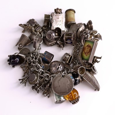 Lot 326 - A silver bracelet containing a large quantity...