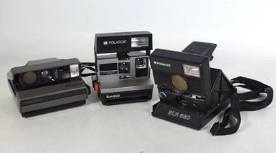 Lot 237 - A Polaroid SLR680 camera, having a nylon neck...