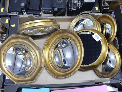 Lot 160 - A collection of gilt-framed convex wall...