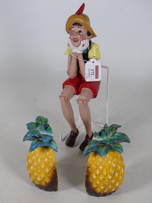 Lot 172 - A pair of painted cast metal bookends,...