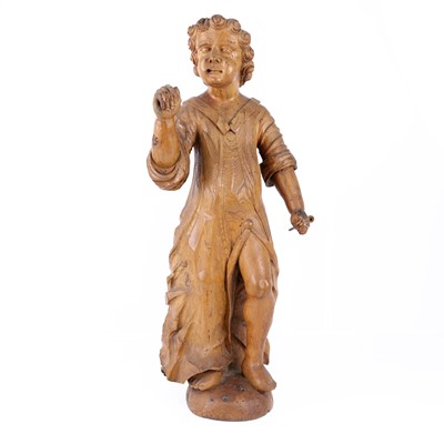 Lot 152 - A continental oak carving of a young boy,...
