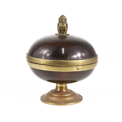 Lot 125 - A circa 1900 brass and tortoiseshell pedestal...