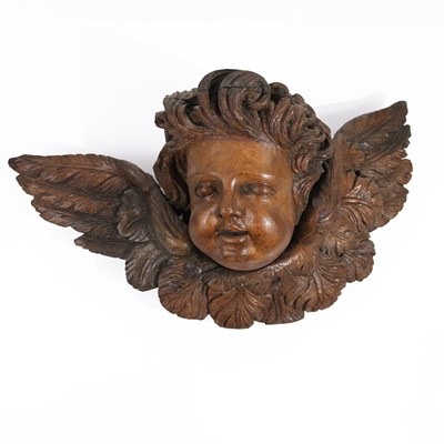 Lot 154 - An 18th century continental carved oak winged...