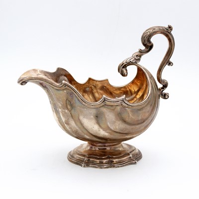 Lot 80 - A George IV silver oversize pedestal sauceboat,...