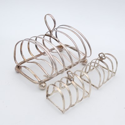 Lot 246 - A pair of George V silver miniature toast...